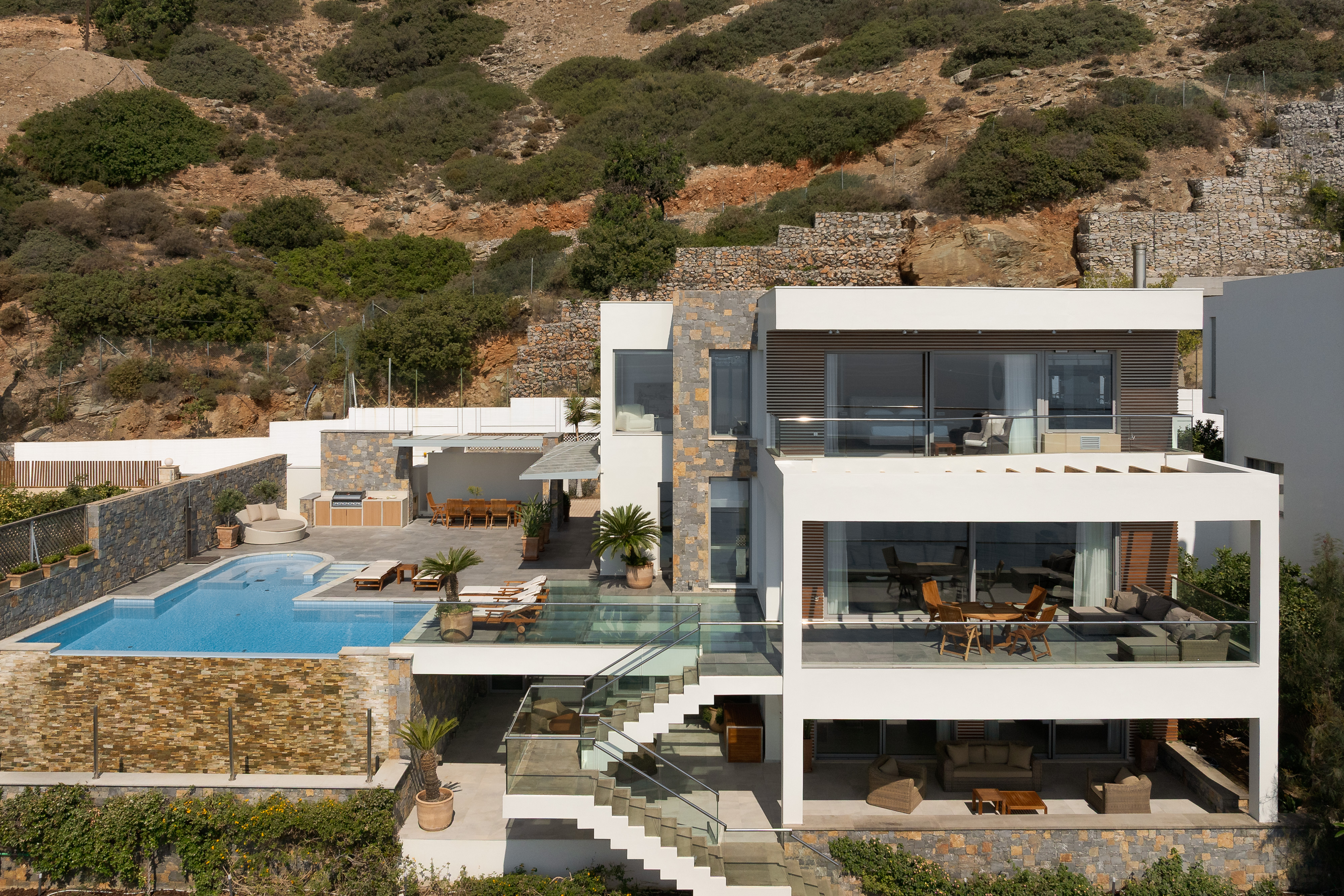 Unwind in luxury where every corner invites serenity and seafront elegance.