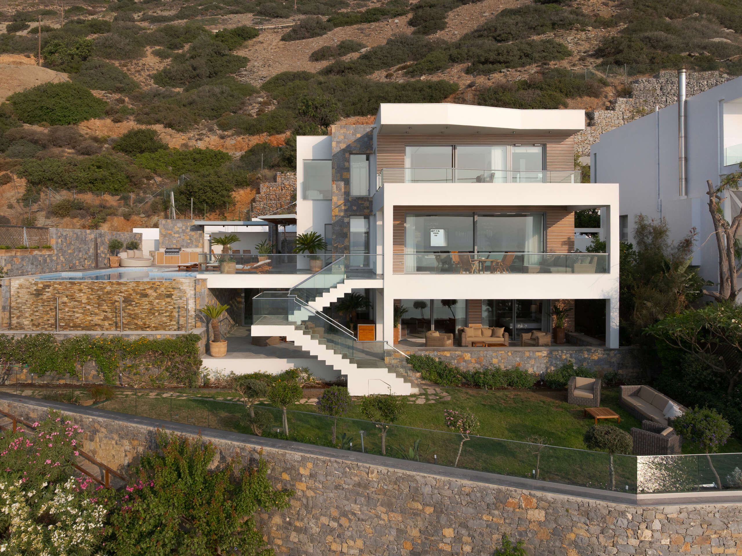 Unwind in luxury where every corner invites serenity and seafront elegance.